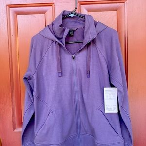 Athleta Triumph hoodie in PL.  deep purple in color. Never worn.